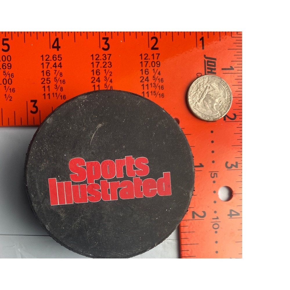 Title: Vintage Sports Illustrated Official Hockey Puck Black Red Logo Collectibl